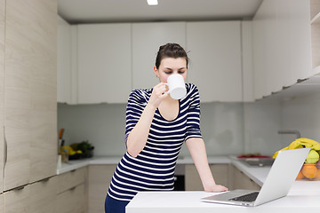 Image showing woman drinking coffee enjoying relaxing lifestyle