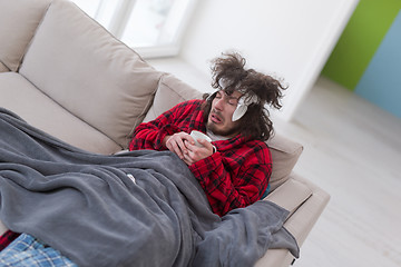 Image showing young Man with flu and fever