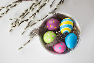 Image showing colored easter eggs and pussy willow branches