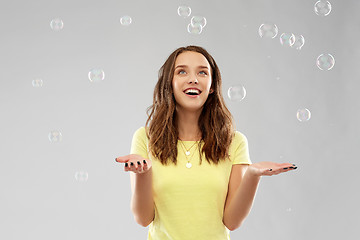 Image showing young woman or teenage gir with soap bubbles