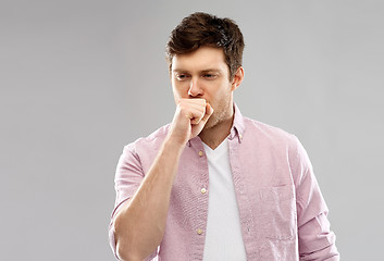 Image showing unhealthy young man coughing