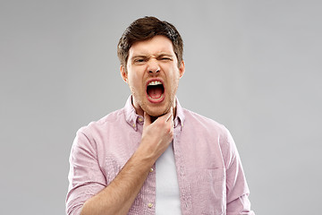 Image showing screaming man suffering from sore throat