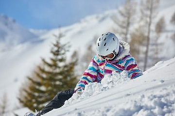 Image showing Skier having a rest in the snow