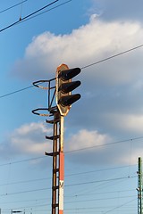 Image showing Railway signal light on a rusty post