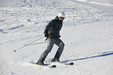 Image showing Skiing in the winter snowy slopes