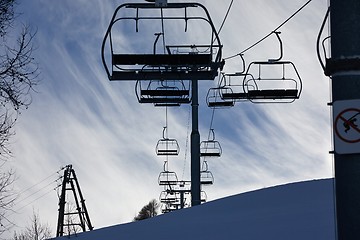 Image showing Ski lift ascending the mountain