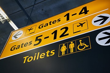 Image showing Toilet and gates signs showing direction