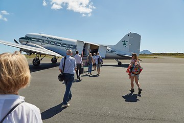 Image showing DC-3 at the airport, passangers boarding