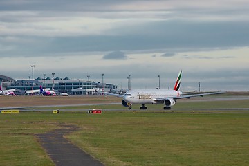 Image showing BUDAPEST, HUNGARY - DECEMBER 1, 2015: Emirates Boeing 777-300 taking off at Budapest Airport. This was the start of Emirates operating 777s on their route to Budapest.