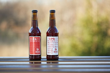 Image showing Beer bottles on a table