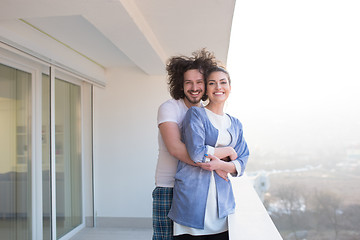 Image showing Couple hugging on the balcony