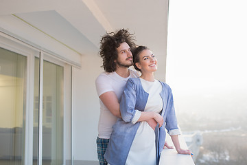 Image showing Couple hugging on the balcony