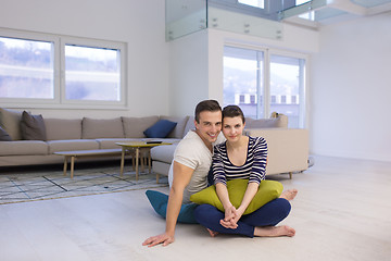 Image showing couple sitting on the floor at home