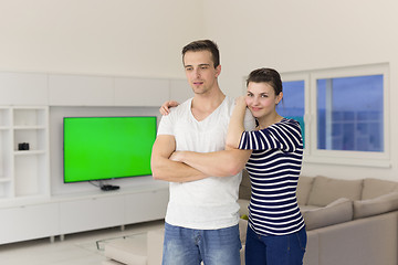 Image showing couple hugging in their new home