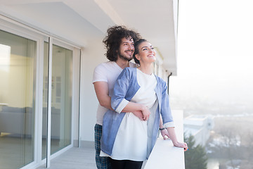 Image showing Couple hugging on the balcony