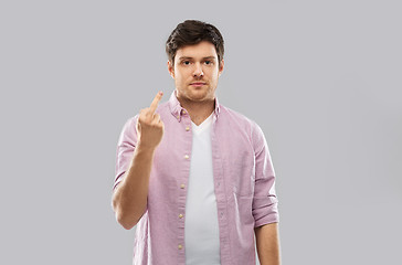 Image showing young man over grey background