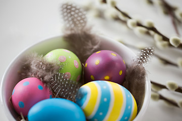 Image showing colored easter eggs and pussy willow branches