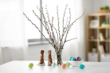 Image showing pussy willow, easter eggs and chocolate bunnies