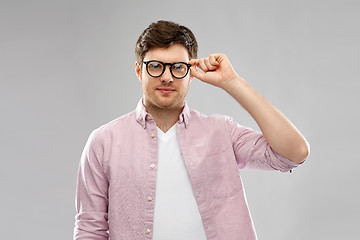 Image showing young man in glasses over grey background