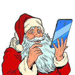 Image showing Santa Claus and a big smartphone. Electronic Christmas sales and orders in online stores