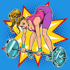 Image showing Female athlete weightlifting lifting barbell