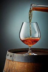 Image showing cognac pouring into glass