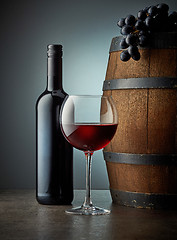 Image showing glass and bottle of red wine