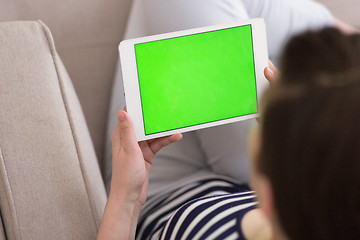 Image showing woman on sofa using tablet computer