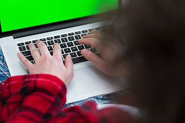 Image showing man freelancer in bathrobe working from home