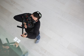 Image showing videographer at work
