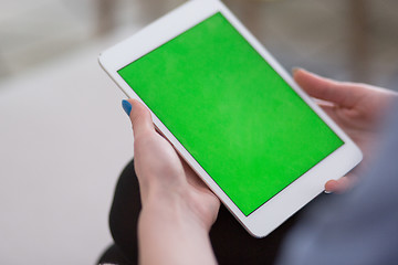 Image showing woman on sofa using tablet computer