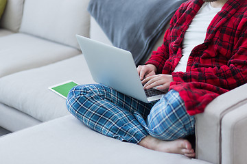 Image showing man freelancer in bathrobe working from home