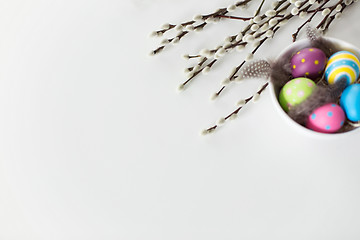 Image showing colored easter eggs and pussy willow branches