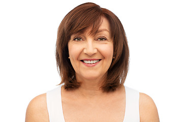 Image showing portrait of smiling senior woman over white