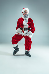 Image showing Funny guy in christmas hat. New Year Holiday. Christmas, x-mas, winter, gifts concept.