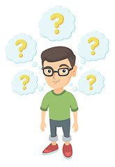 Image showing Thinking caucasian boy with question marks.
