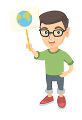 Image showing Caucasian boy holding a placard with planet.