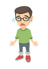 Image showing Sad caucasian boy in glasses sobbing.