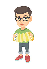 Image showing Caucasian boy in glasses playing the accordion.