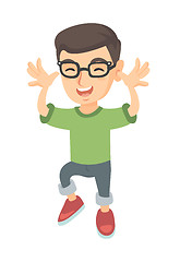 Image showing Funny caucasian boy in glasses teasing with hands.