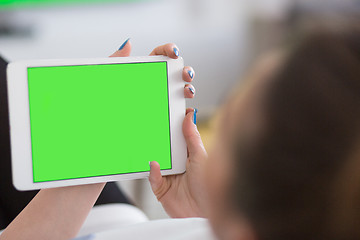 Image showing woman on sofa using tablet computer