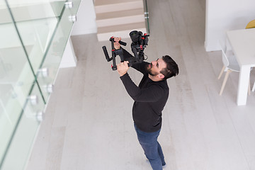 Image showing videographer at work