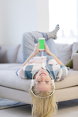 Image showing girl enjoying music through headphones