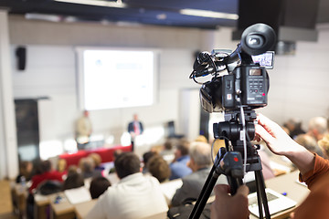 Image showing Business Conference and Presentation. Audience at the conference hall. Television broadcasted press conference