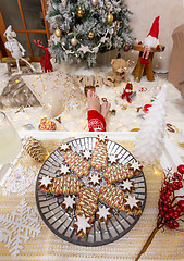 Image showing Christmas food and lots of Christmas decorations in front of the