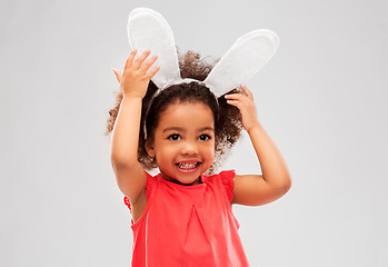 Image showing happy little girl wearing easter bunny ears