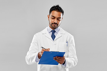 Image showing indian male doctor or scientist with clipboard