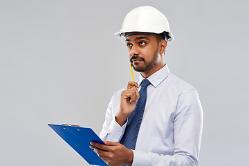 Image showing architect or businessman in helmet with clipboard