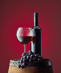 Image showing glass and bottle of red wine