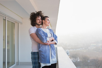 Image showing Couple hugging on the balcony